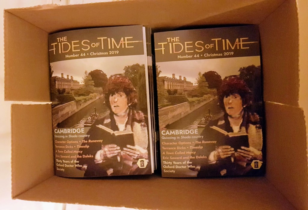 Printed copies of The Tides of Time issue 44, in a cardboard box.