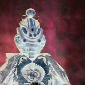 Omega as he appears in Arc of Infinity before he has fully crossed from the anti-matter universe.